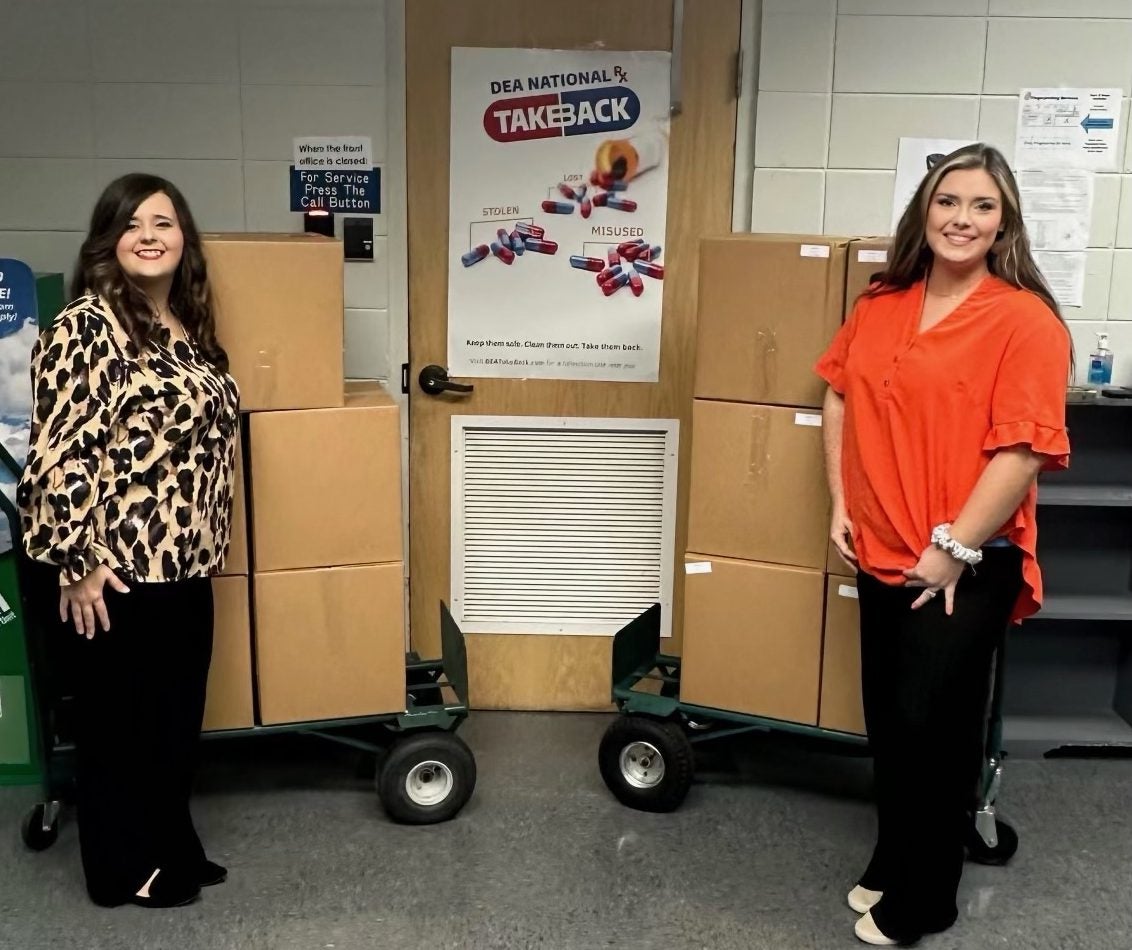 Shelby Hernandez (left) and Julia Allen (right), Data Analysts at the Oxford Police Department, during the National Prescription Drug Take Back Day on Oct. 28. Photo courtesy of Oxford Police Department.
