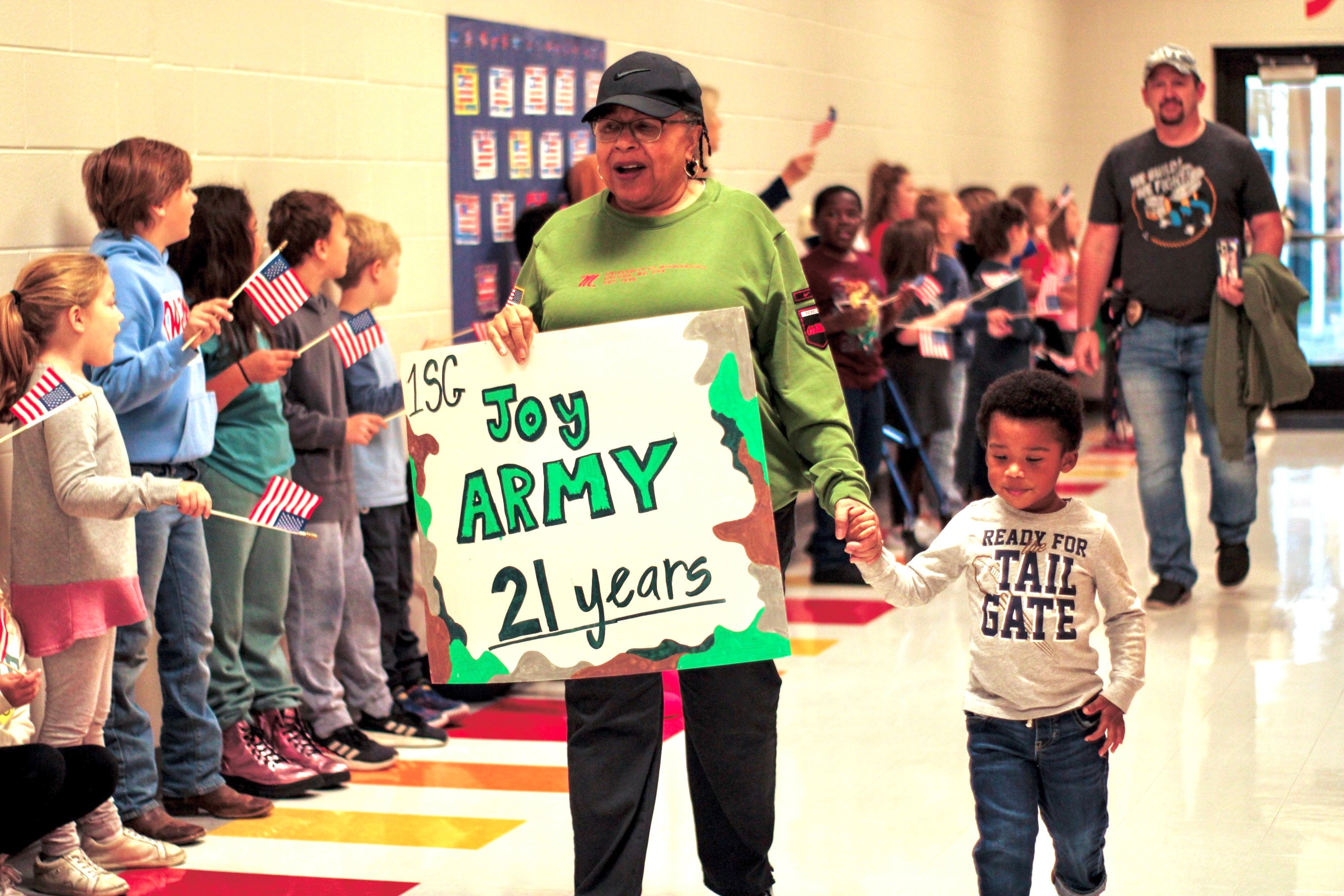 Lafayette Elementary honors military service with an indoor Veterans Day parade, shifting from outdoor plans due to rain, engaging students.