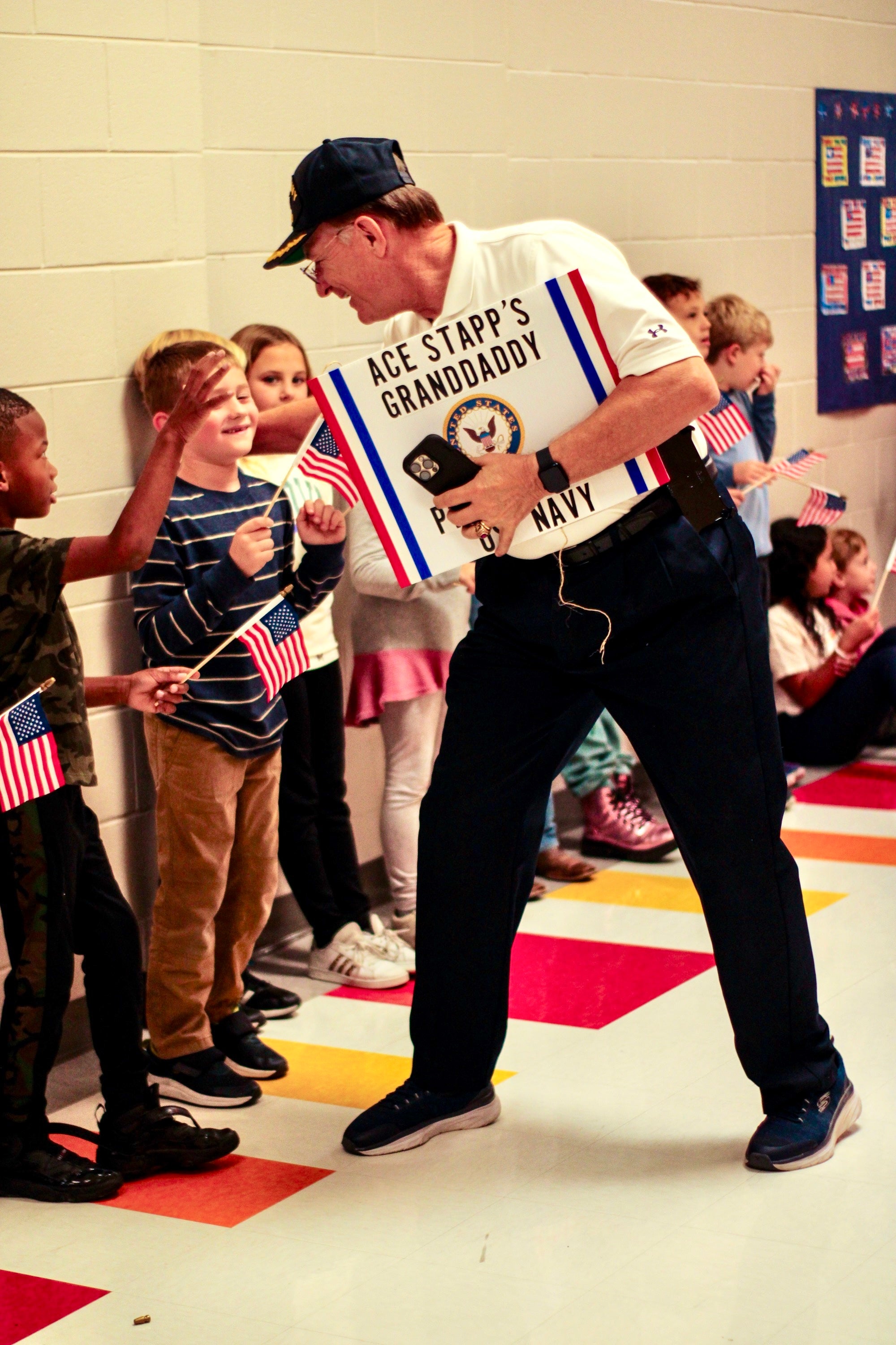Lafayette Elementary honors military service with an indoor Veterans Day parade, shifting from outdoor plans due to rain, engaging students.
